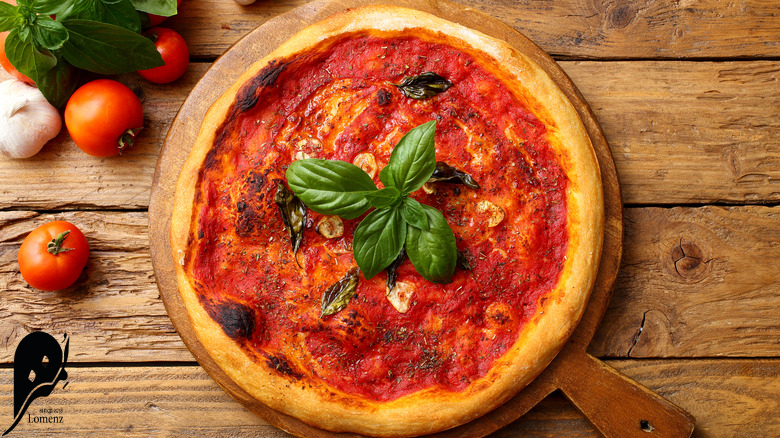 پیتزای آمریکایی و ایتالیایی چه تفاوتی دارند؟ 2 پیتزا ایتالیایی ماریانا